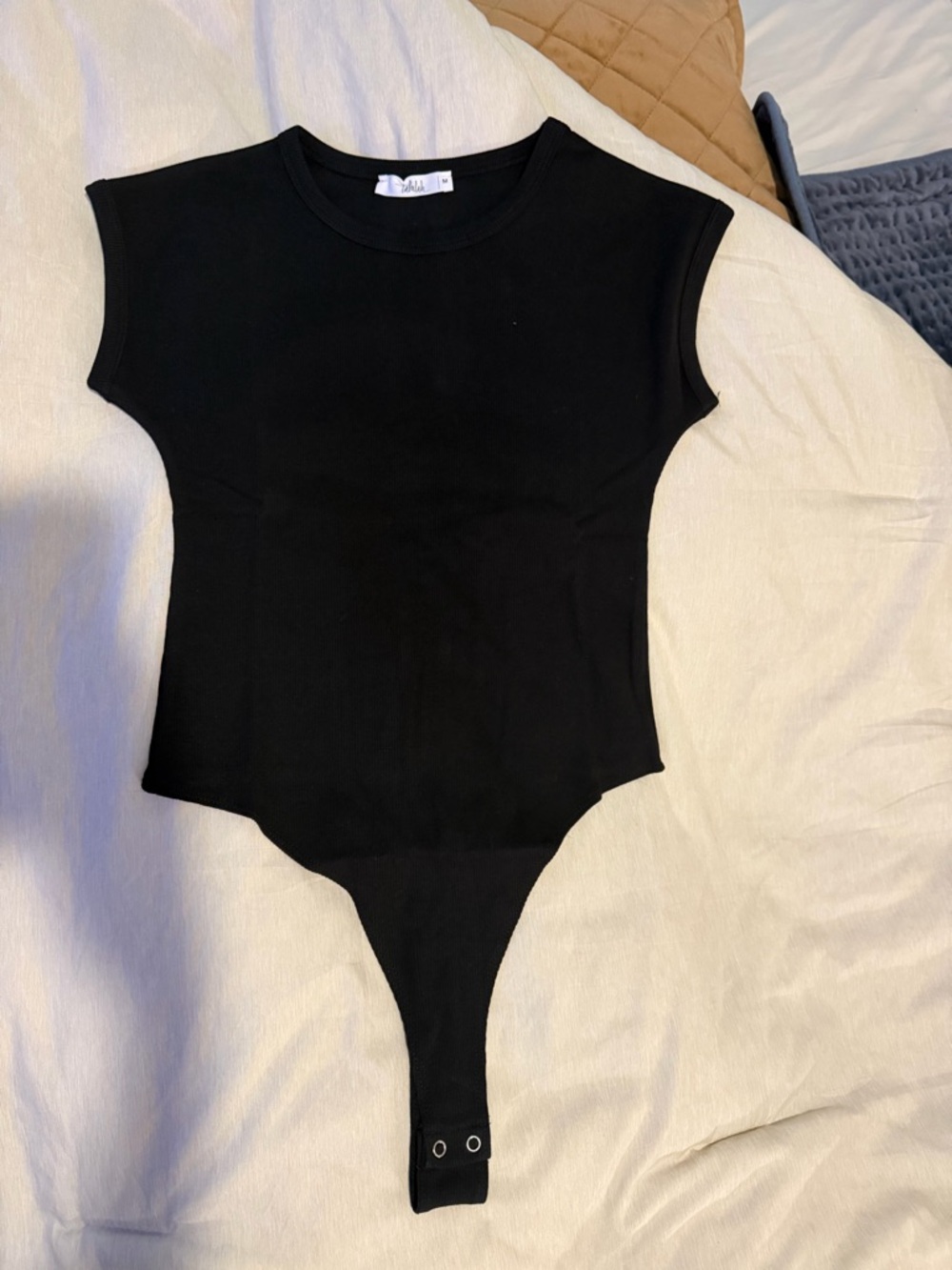 TALULAH Black One-Piece Bodysuit